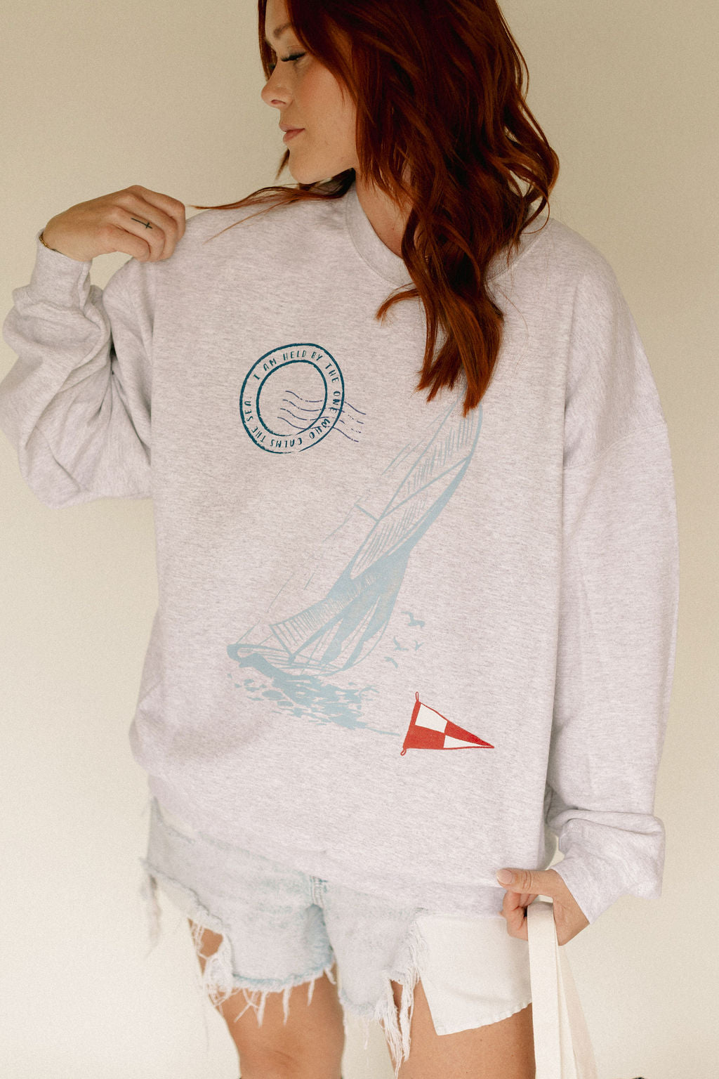 I am held by the one who calms the sea Graphic Sweatshirt